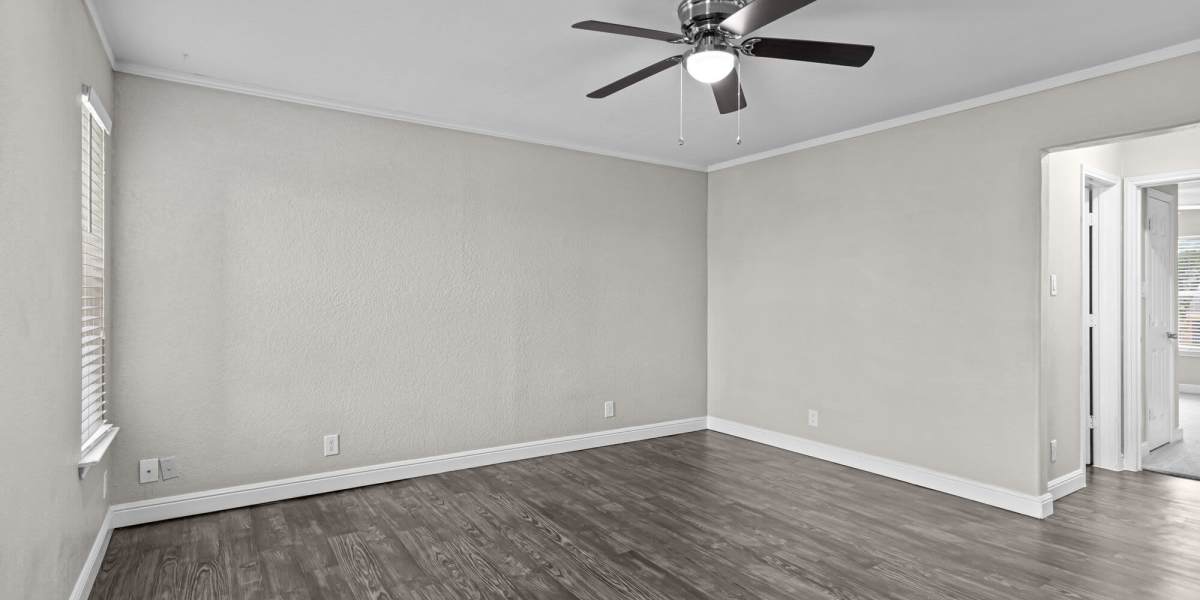 Empty living room angle 4 Towne Lake Apartments in Granbury, Texas