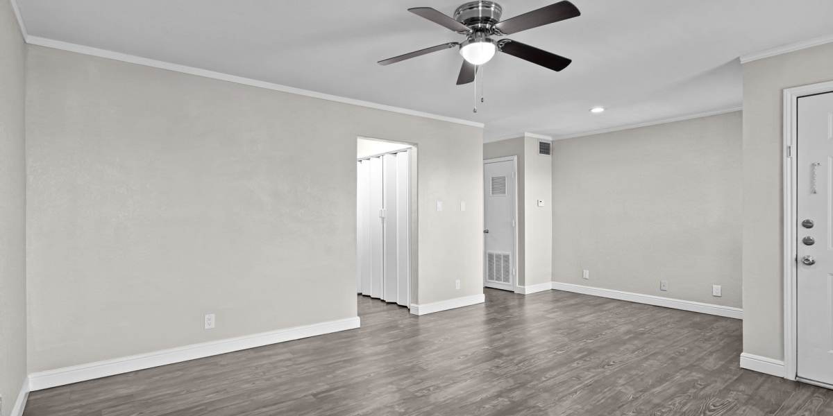 Empty living room angle 2 Towne Lake Apartments in Granbury, Texas