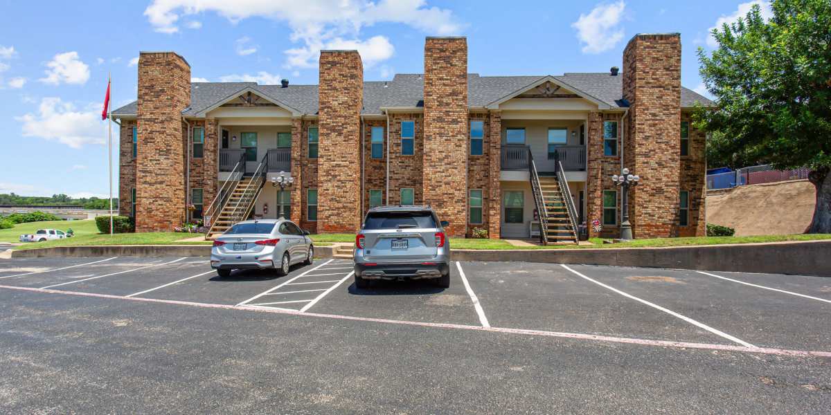 parking lot outside at Towne Lake Apartments in Granbury, Texas