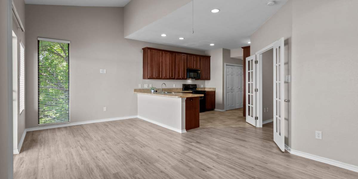 Empty living room angle 1 Towne Square Condos at The Lodge in Granbury, Texas