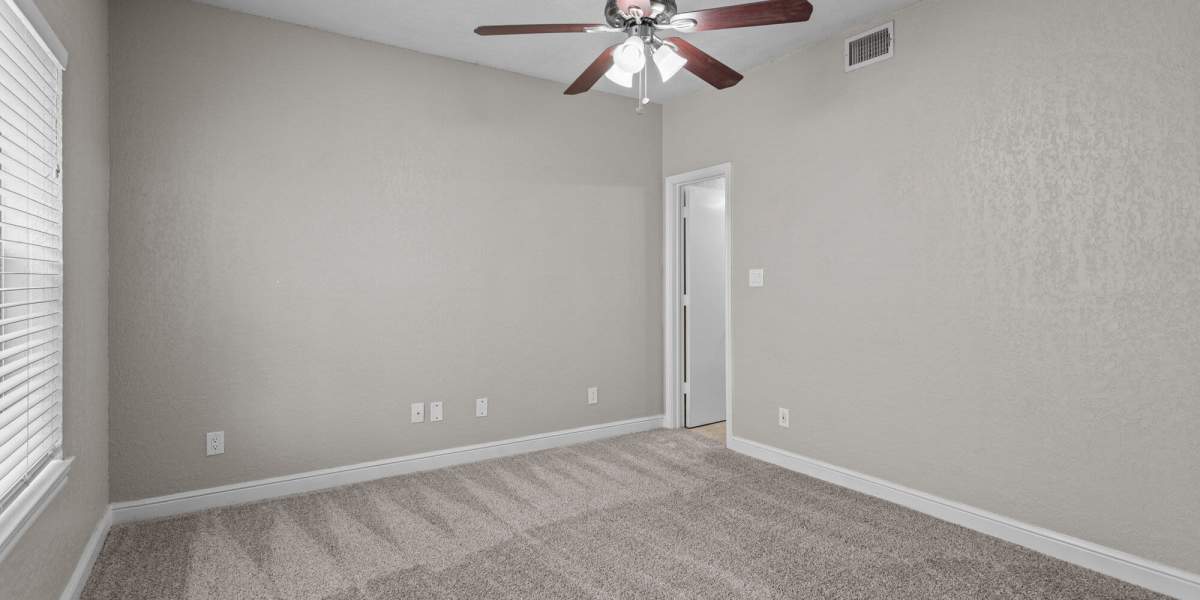 carpeted bedroom 3 at Towne Square Condos at The Lodge in Granbury, Texas