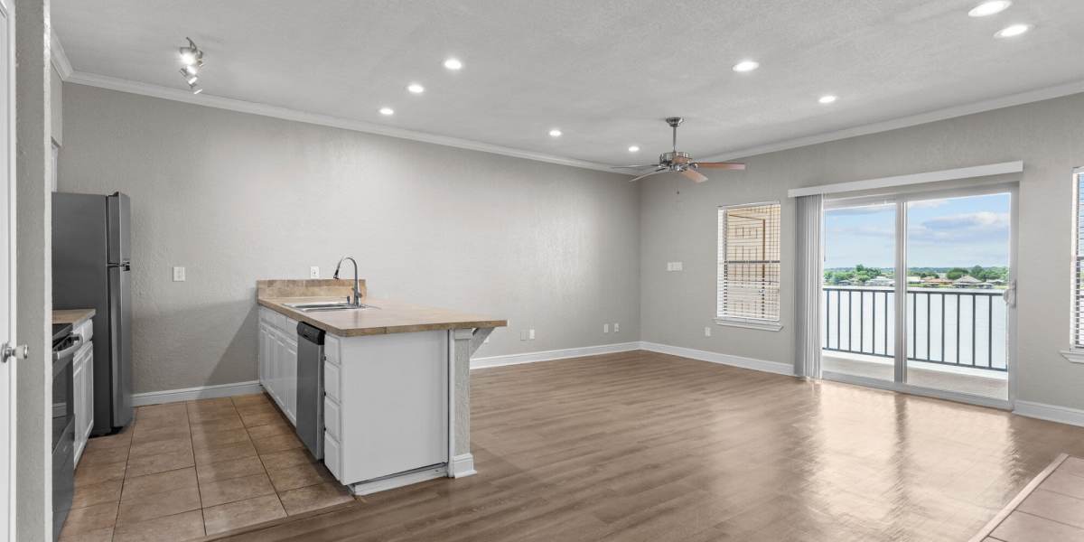 living room and kitchen at Towne Square Condos at The Lodge in Granbury, Texas