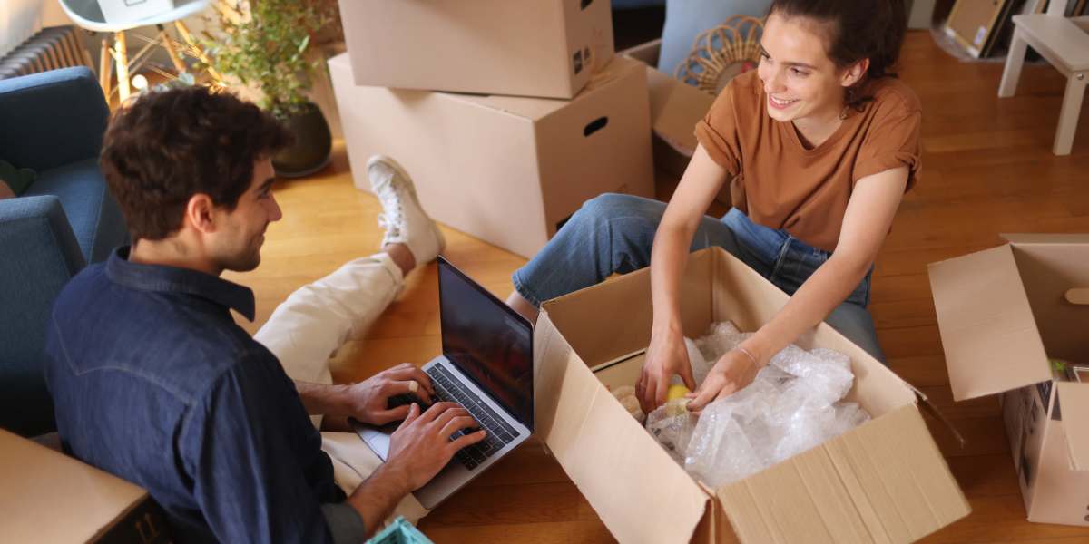 A couple packing things using the boxes from Stayton Mini Storage in Stayton, Oregon