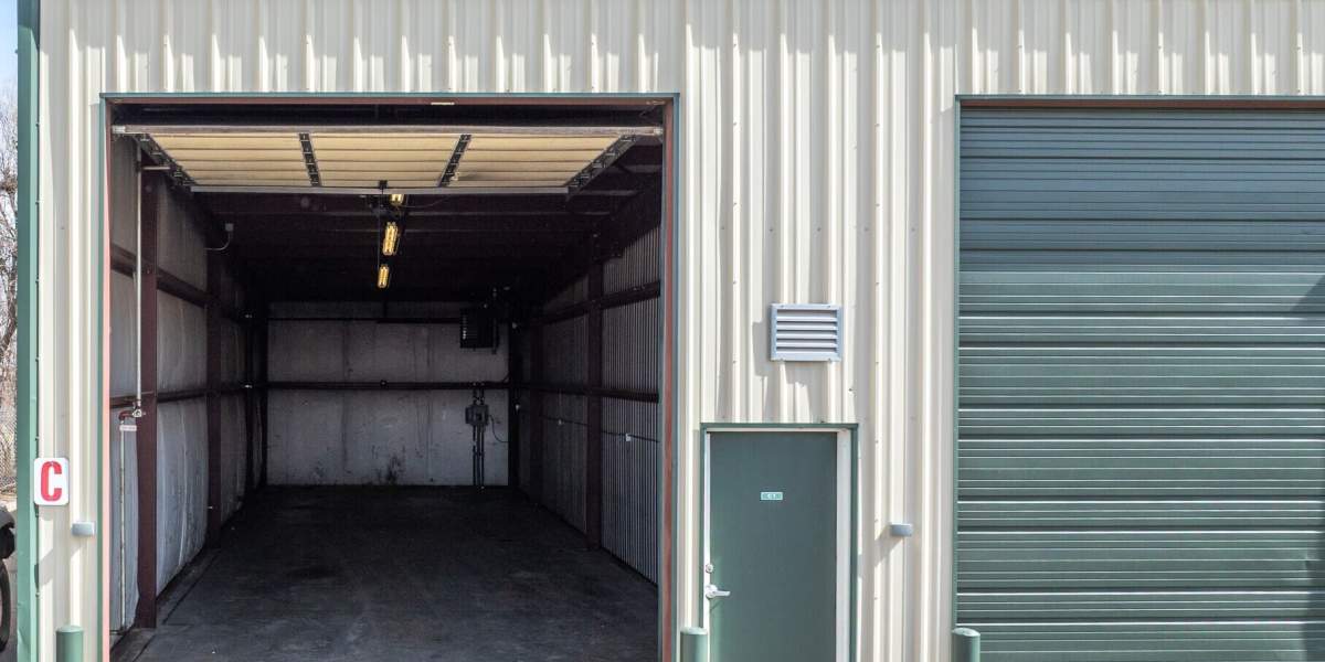 Man lifting a box at Storage Etc Ogden in Ogden, Utah