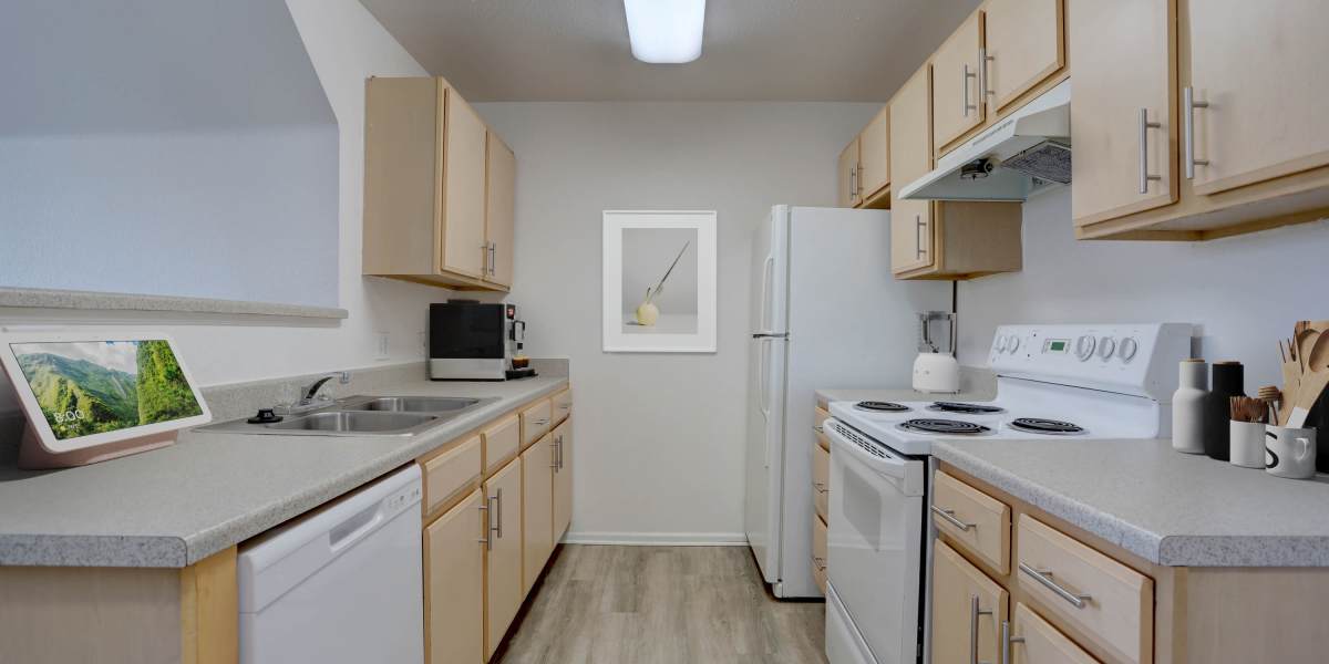 View of kitchen at Westmeadow Peaks Apartments in Colorado Springs, Colorado