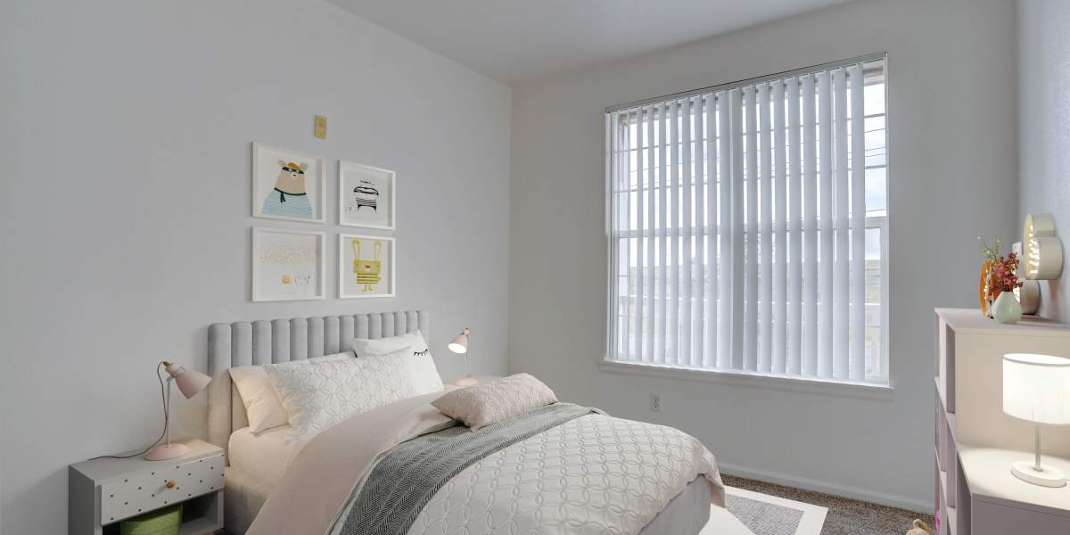 Bedroom with carpet flooring and central air-conditioning at Westmeadow Peaks Apartments in Colorado Springs, Colorado
