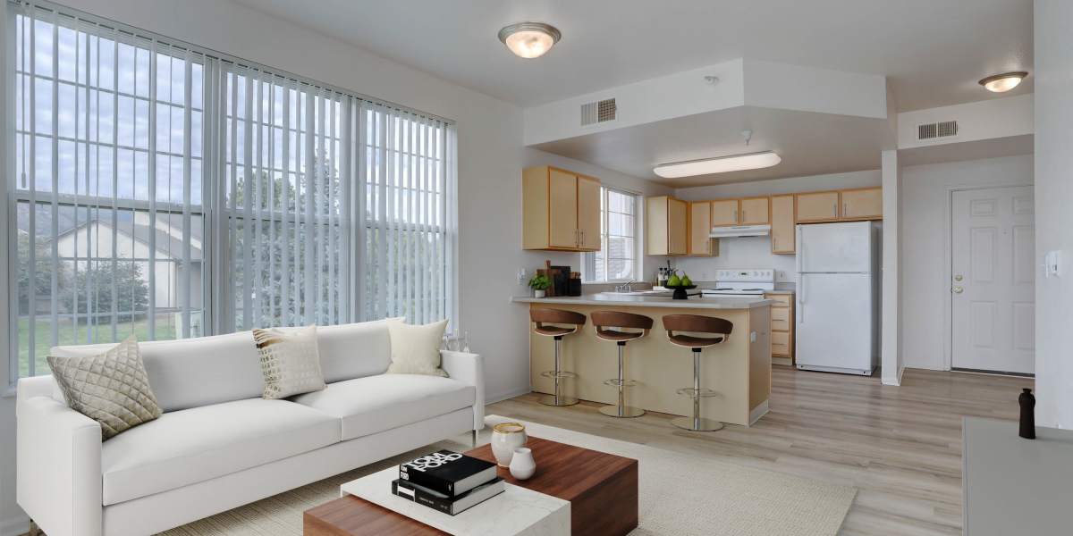 Apartment kitchen with high top seating at Westmeadow Peaks Apartments in Colorado Springs, Colorado