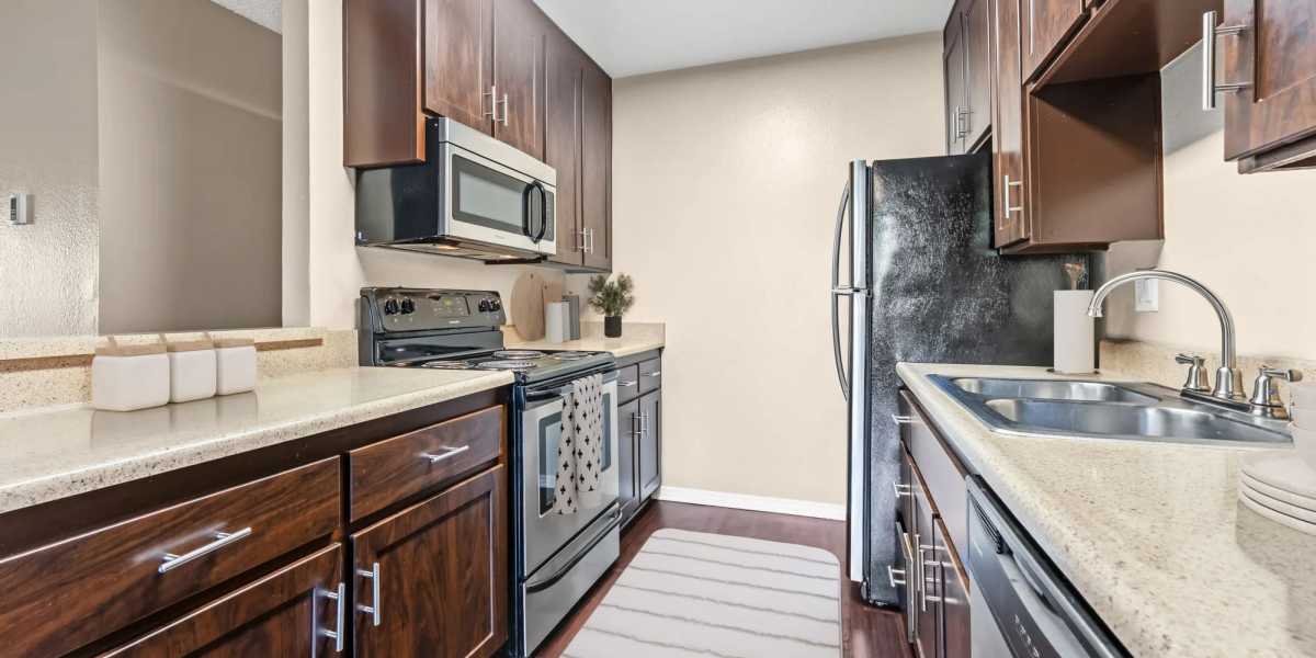 kitchen with stainless-steel appliance  at Shadow Ridge Apartments in Oceanside, California