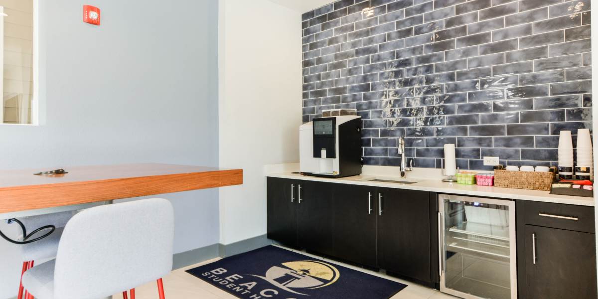 A clubhouse kitchen for resident use at Beacon Springfield in Springfield, Missouri