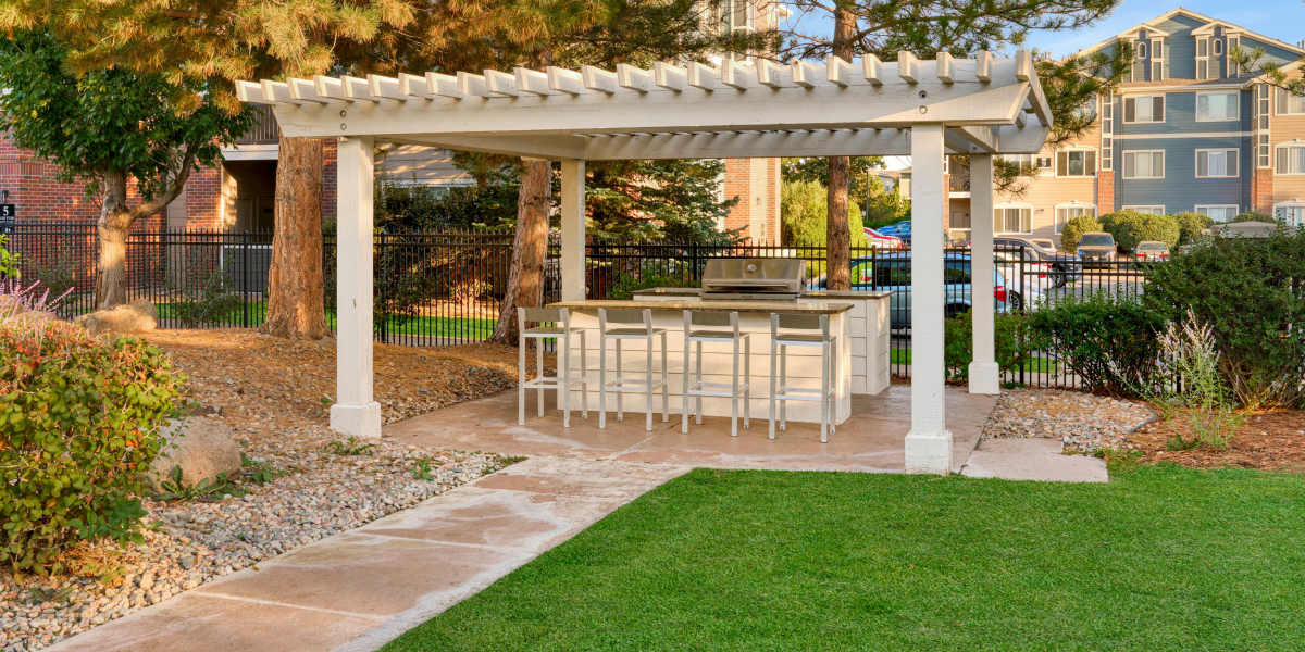 Poolside BBQ Area at Legend Oaks Apartments in Aurora, Colorado