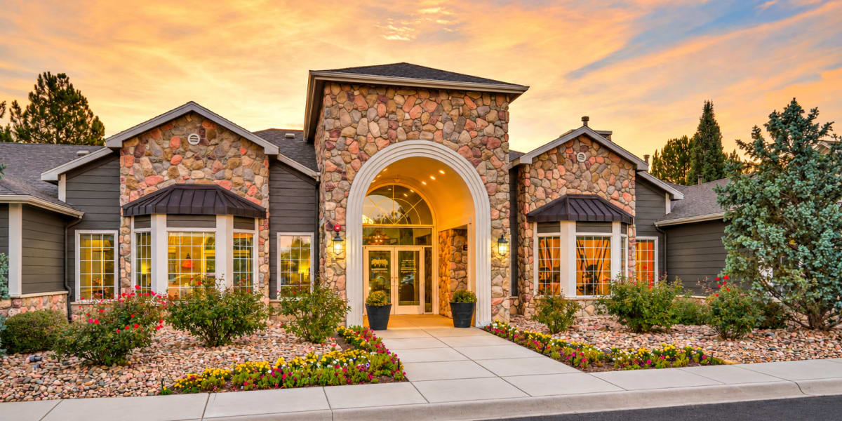 Exterior view of leasing office entrance at Legend Oaks Apartments in Aurora, Colorado