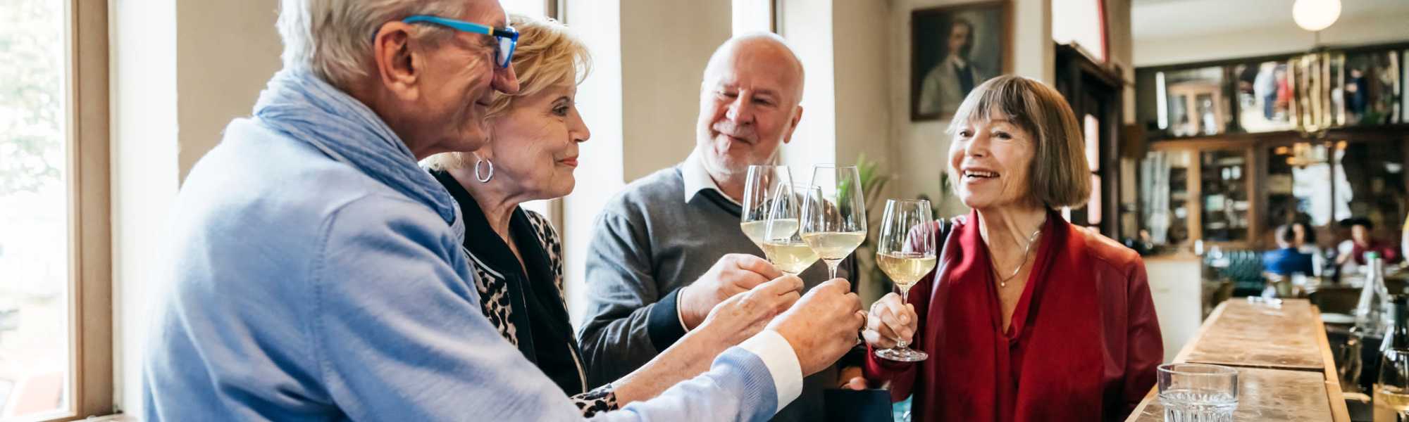 Residents having fun and drinking wine at The Barclay at Vero Beach in Vero Beach, Florida  
