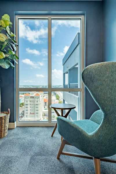 Resident relaxing in his home at Nine20 Manatee in Bradenton, Florida