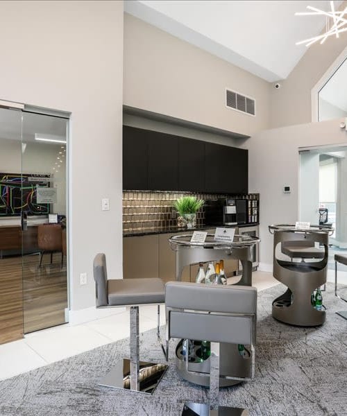 Gourmet coffee bar with bistro tables at Briar Cove Terrace Apartments in Ann Arbor, Michigan