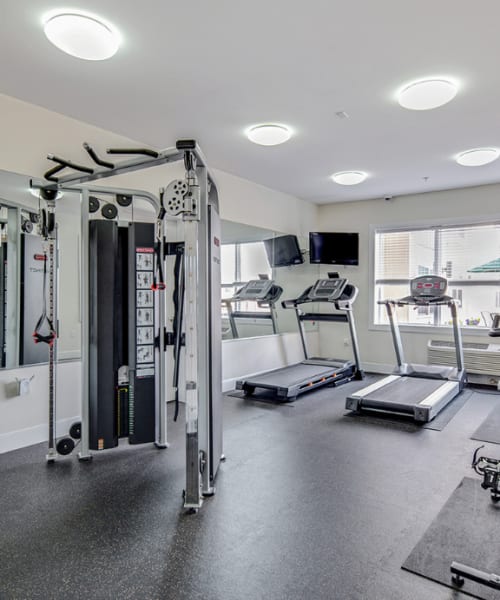 Equipment in the fitness center at Grand Meridia Apartments in Rahway, New Jersey