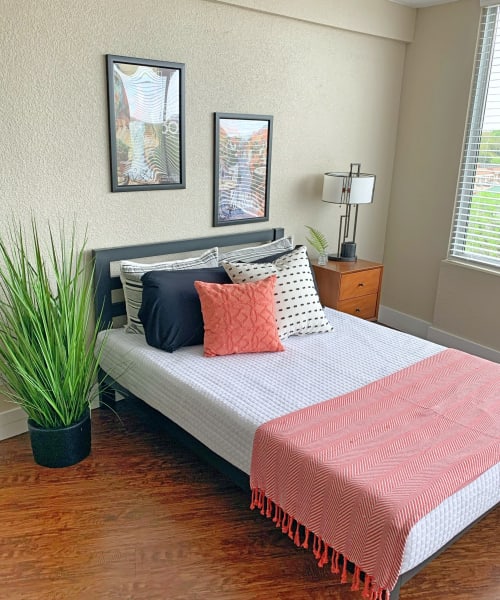 Bedroom with wood-style flooring at The View Tower Apartments, Shreveport, Louisiana