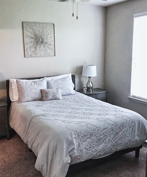 Light and open bedroom at Le Rivage Luxury Apartments in Bossier City, Louisiana