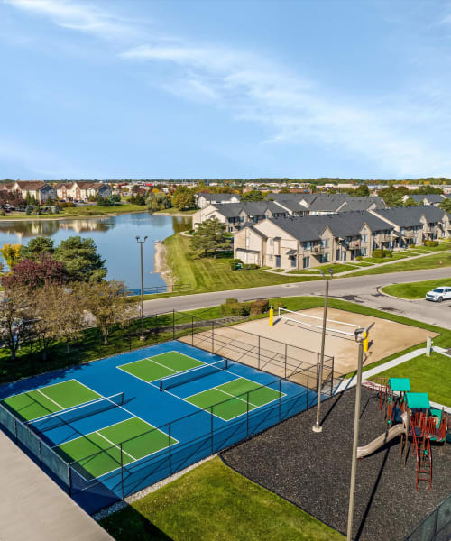 Aerial view of the outdoor amenities and lake at Lakeside Terraces in Sterling Heights, Michigan