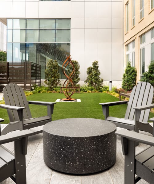 Courtyard sculpture and seating at Instrata at Legacy West in Plano, Texas