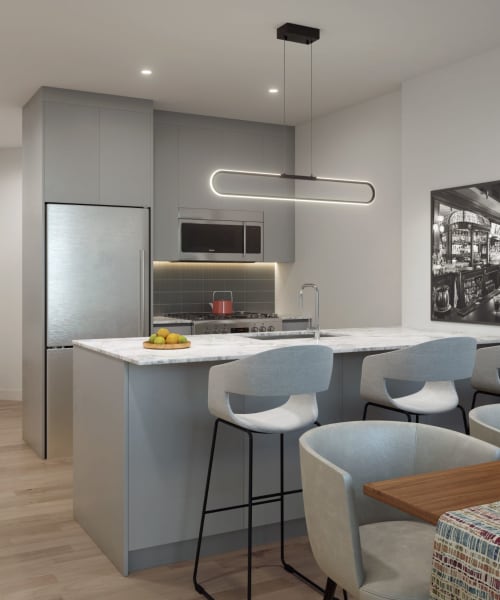 Rendering kitchen apartment at 8 Court Square in Long Island City, New York