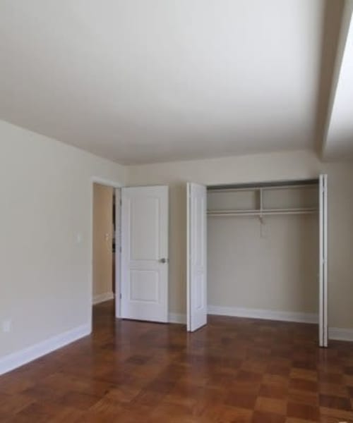 Bedroom with a double door closet at Chelsea Park in Gaithersburg, Maryland