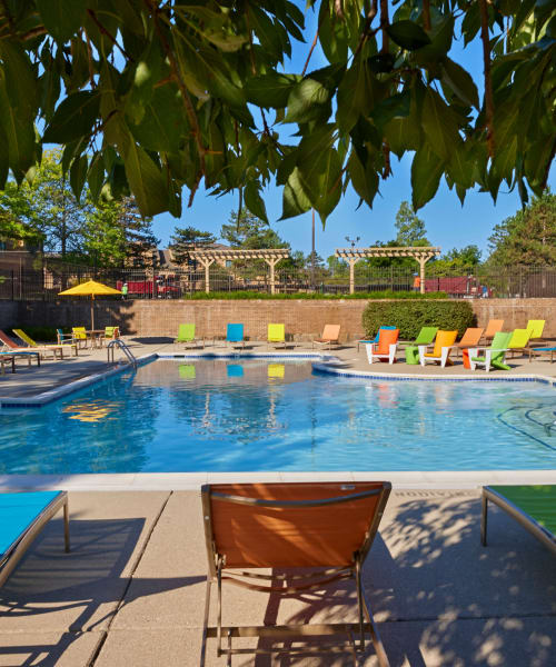 Swimming pool and pergolas at Saddle Creek Apartments in Novi, Michigan
