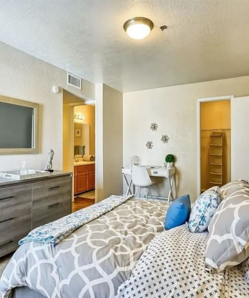 A furnished apartment bedroom at Reserve at Stillwater in Durham, North Carolina