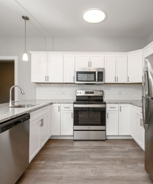 Our Modern Apartments in Cheshire, Connecticut showcase a Kitchen