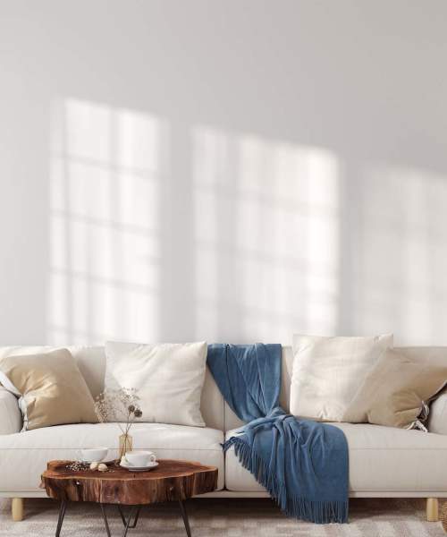 A couch, coffee table and rug in an apartment living room at Copper Range in Colorado Springs, Colorado