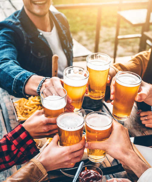 Resident and their friends having drink in bar near Crossings At NoDa in Charlotte, North Carolina