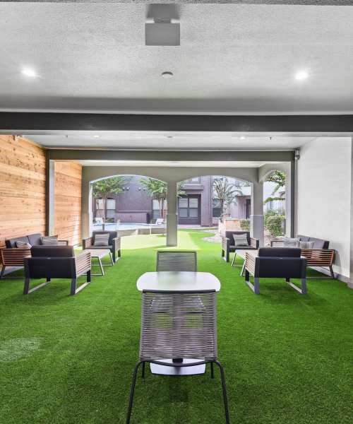 Community seating area with multiple chiairs at The Fitz in Houston, Texas