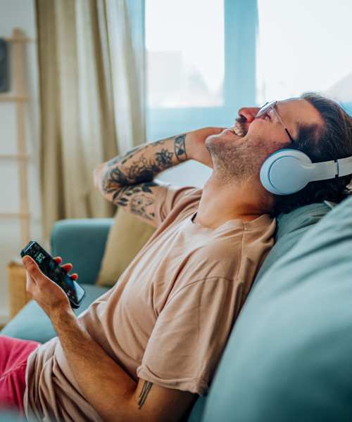 Resident listening to music at Citrus Run Apartments in Tampa, Florida