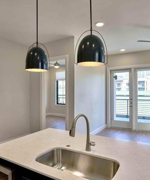 Kitchen with granite countertops at Pearl Lofts in Dallas, Texas