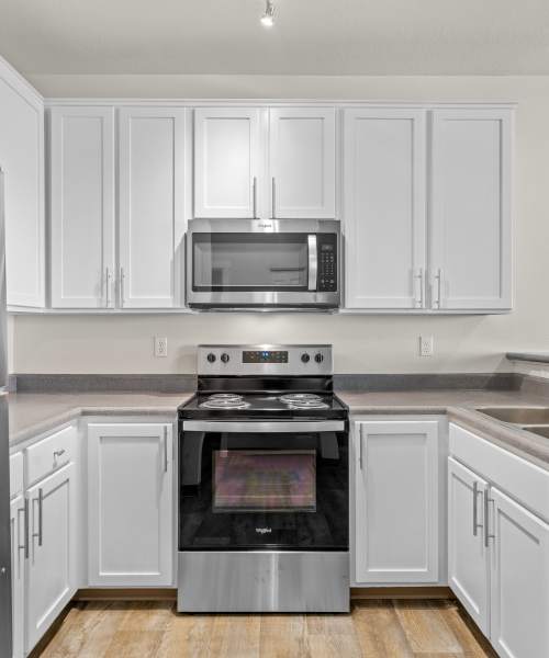 Microwave and Oven in Apartment at Chinook Way Apartments in Fairview, Oregon