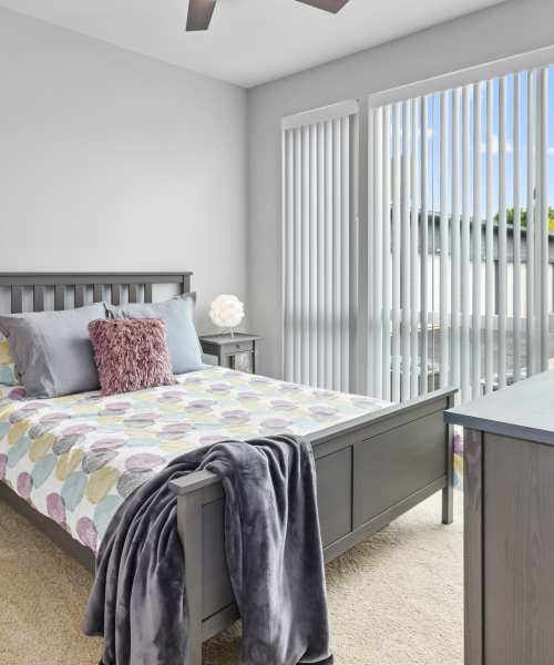 Cozy bedroom with closet space at VerraWest in Longmont, Colorado