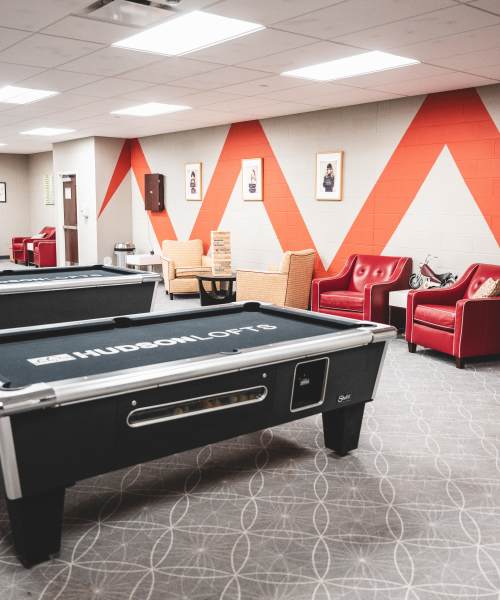 Game room with dart board at Hudson Lofts in Erie, Pennsylvania