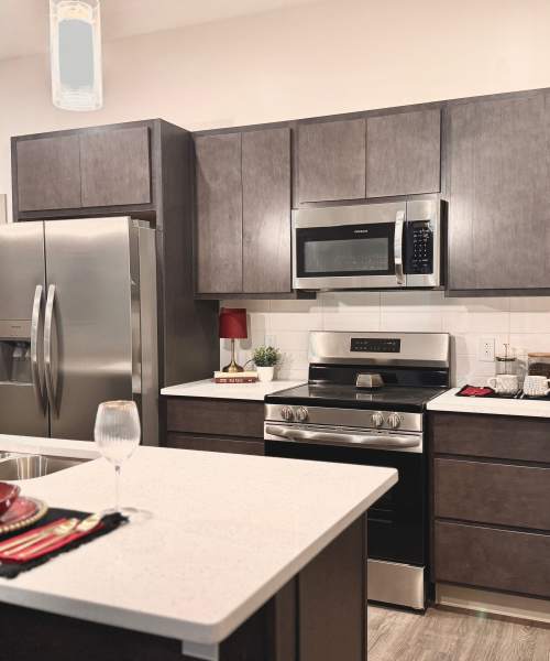 Kitchen with sink at The Maxx and The Alexandra in Pittsburgh, Pennsylvania