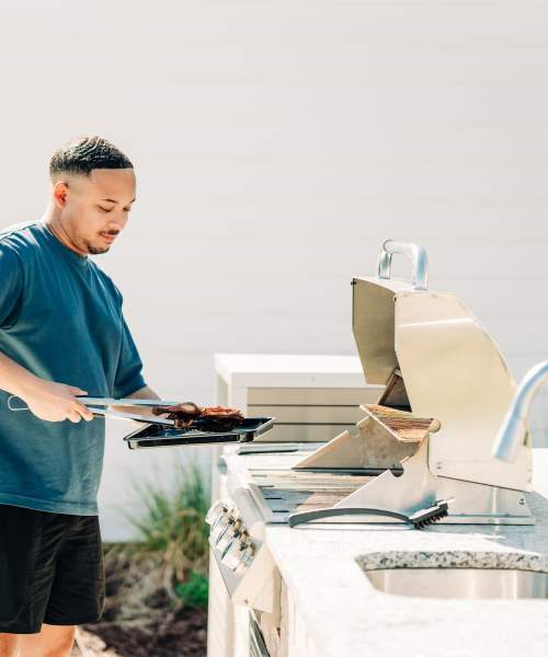 Resident cooking at The Flats at Crosspointe in Columbia, South Carolina
