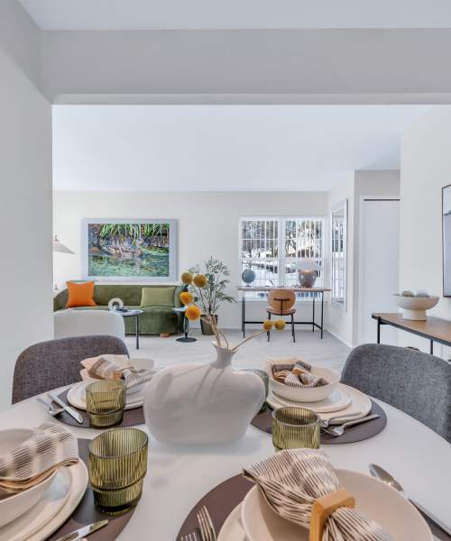 Dining room table set to entertain in a model home at Muirwood in Farmington Hills, Michigan