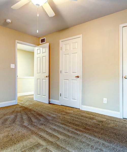 Spacious bedroom with ceiling fan at Stanton Oaks in Atlanta, Georgia