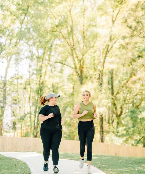 Residents jogging on a trail near The Flats at Crosspointe in Columbia, South Carolina