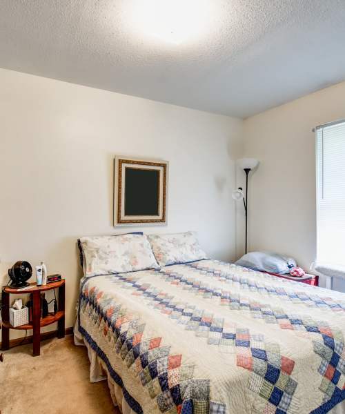 Comfy bedroom at Catawba Club in Berkeley Springs, West Virginia