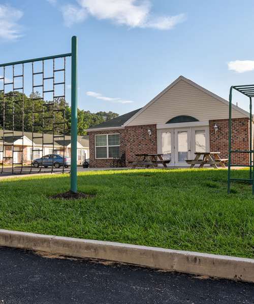 Playground and outdoor seating area at Muirwood Greene in Romney, West Virginia