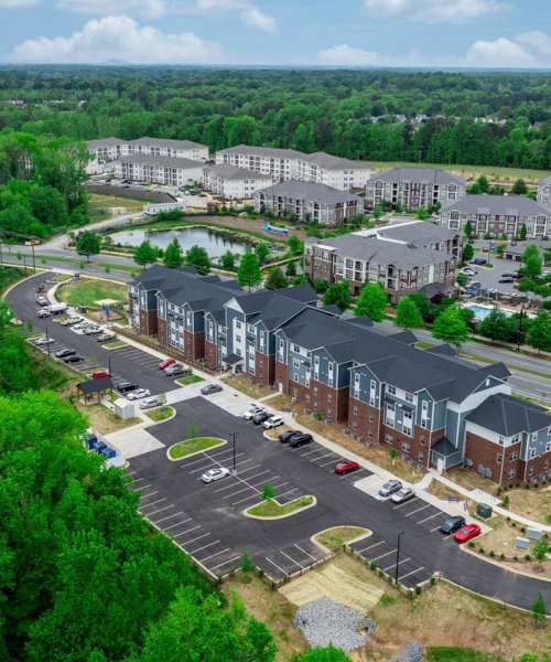 Aerial view of apartment community with parking lot at Northlake Center Apartments in Charlotte, North Carolina