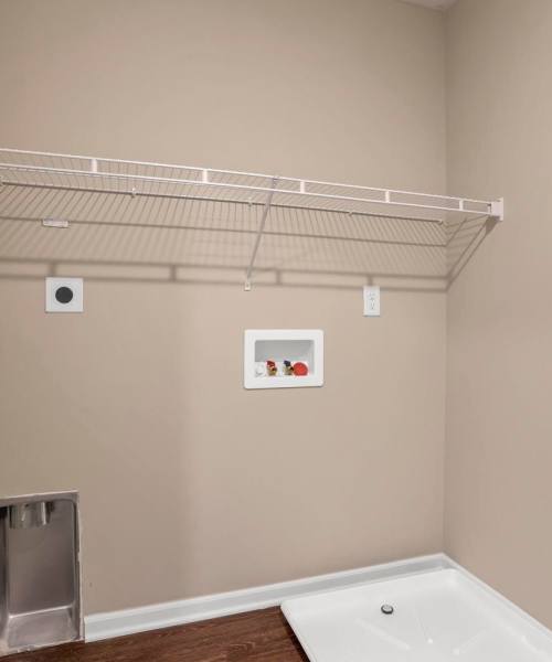 Wire shelving in laundry room at Wendler Commons in Columbus, Ohio