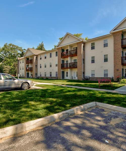 Gated entrance with landscaped grounds at Tall Trees in Tiffin, Ohio