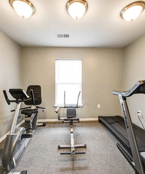Fitness center with cardio equipment at Crowfield Greene in Goose Creek, South Carolina