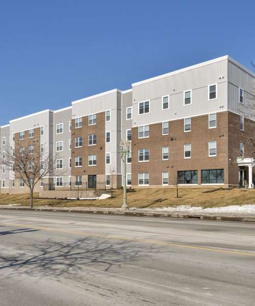 Modern brick and siding exterior at Newton Family Apartments in Canton, Ohio