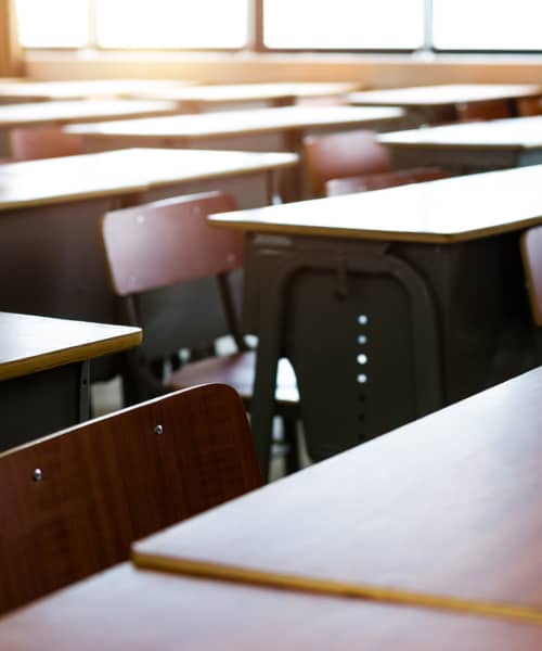 Wooden desks arranged in a classroom at Riverview Place in Ripley, Ohio
