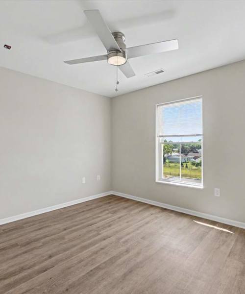 Ceiling fan with light fixture in room at Brentnell Terrace in Columbus, Ohio
